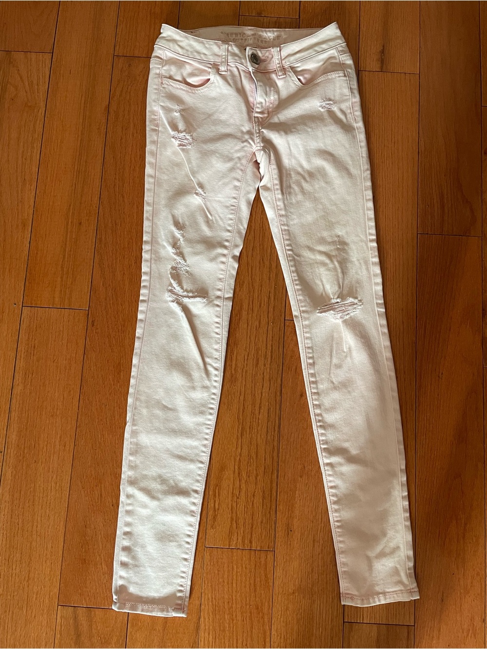 American Eagle Outfitters Light Pink Ripped Skinny Jeans
